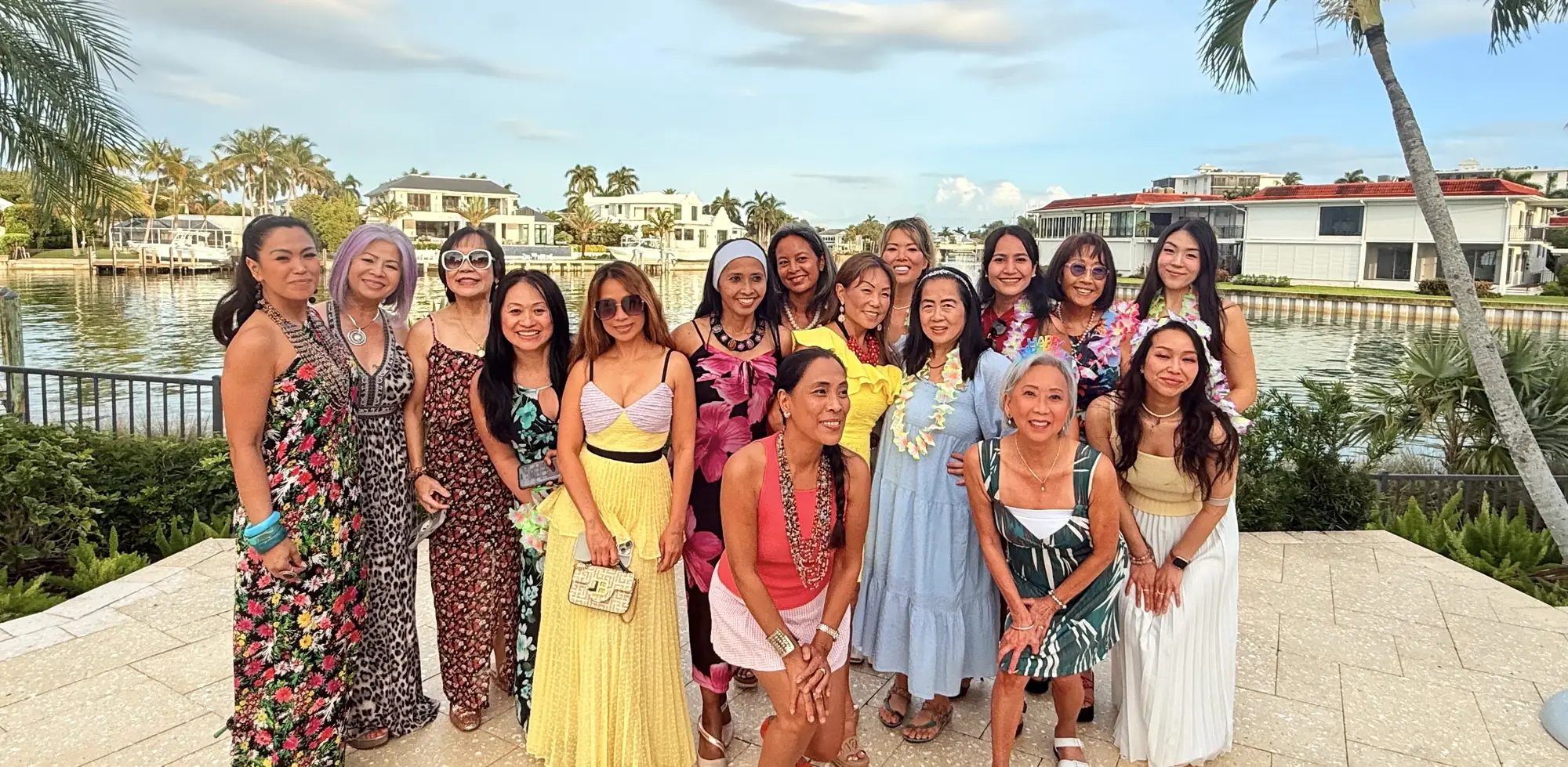 APWS members gathered on a waterfront terrace in Naples